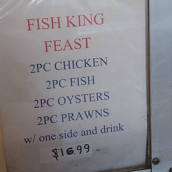 A menu board displays the "Fish King Feast" with chicken, fish, oysters, prawns, a side, and a drink for $16.99.